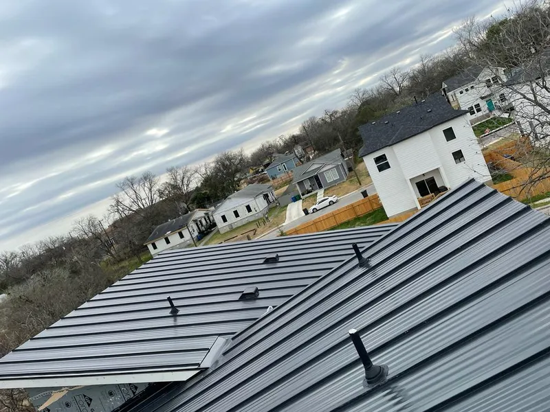 Standing seam metal roof panels with vents for Skylight Repair in Roxborough Park